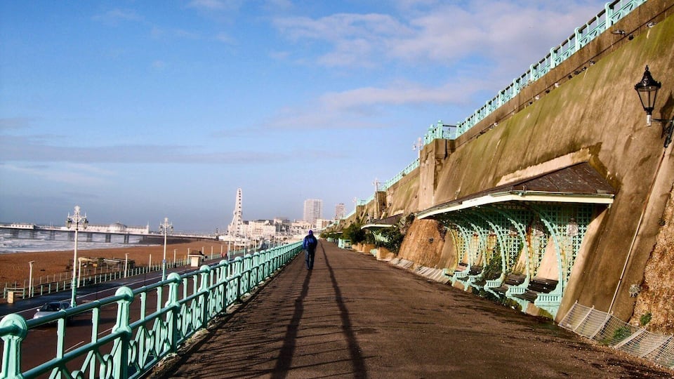 Max Miller Walk, Brighton. This path aka "The Shelf" provides a walkway between Madeira Drive and Marine Parade on Brighton Seafront. Brighton Wheel and Brighton Pier can be seen in the background