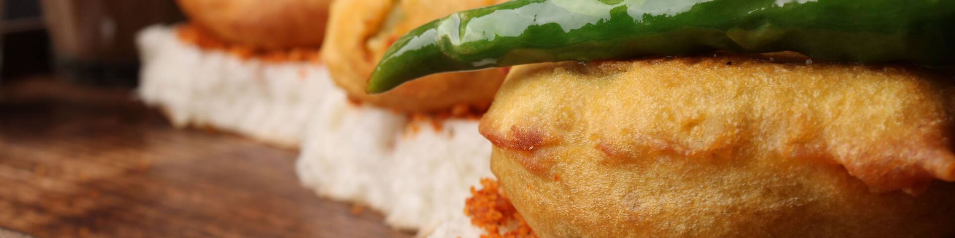 Masala cutting chai and Bombay vada paav is an indian burger. Potato patty is deep fried in gram flour or besan batter it is served hot with paav or bun like sandwich.