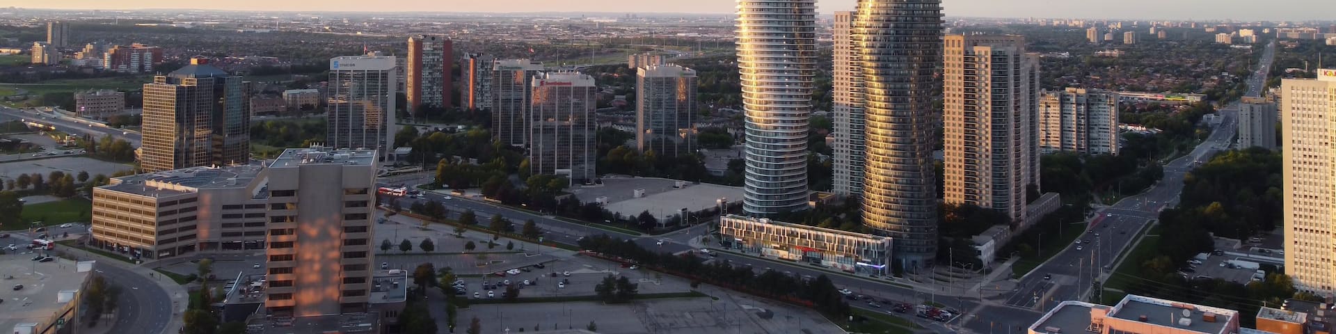 Aerial view of downtown Mississauga, Ontario, Canada landmark Absolute buildings condominiums. Looking east down Burnhamthorpe Road towards Hurontario Street. Shot on a beautiful summer afternoon.
