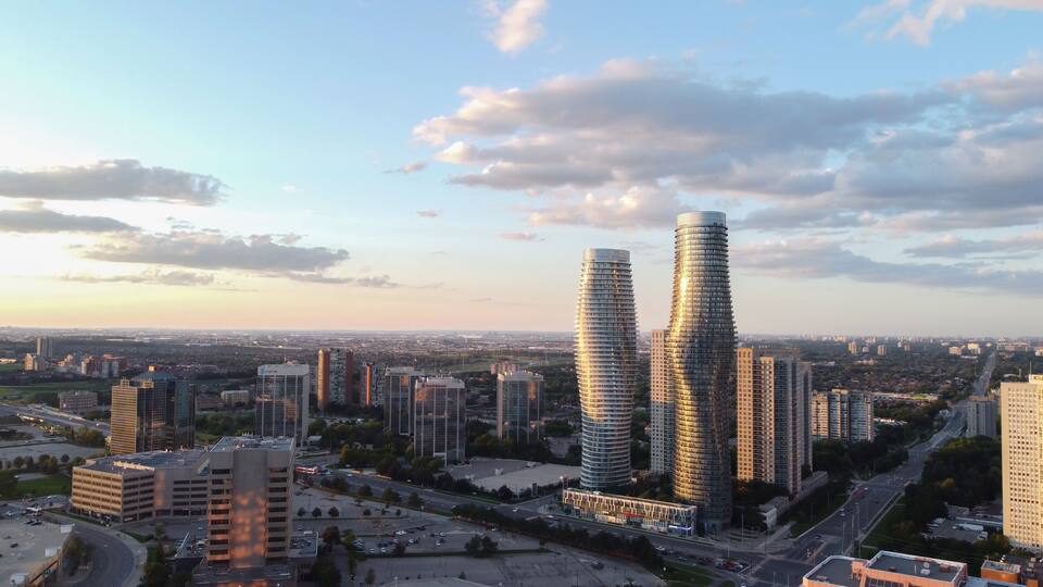 Aerial view of downtown Mississauga, Ontario, Canada landmark Absolute buildings condominiums. Looking east down Burnhamthorpe Road towards Hurontario Street. Shot on a beautiful summer afternoon.