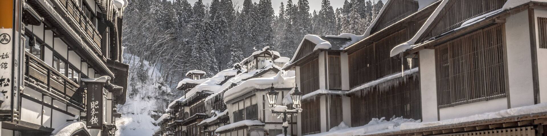 romantic winter snow in Obanazawa Ginzan Onsen, Japan hot springs town.