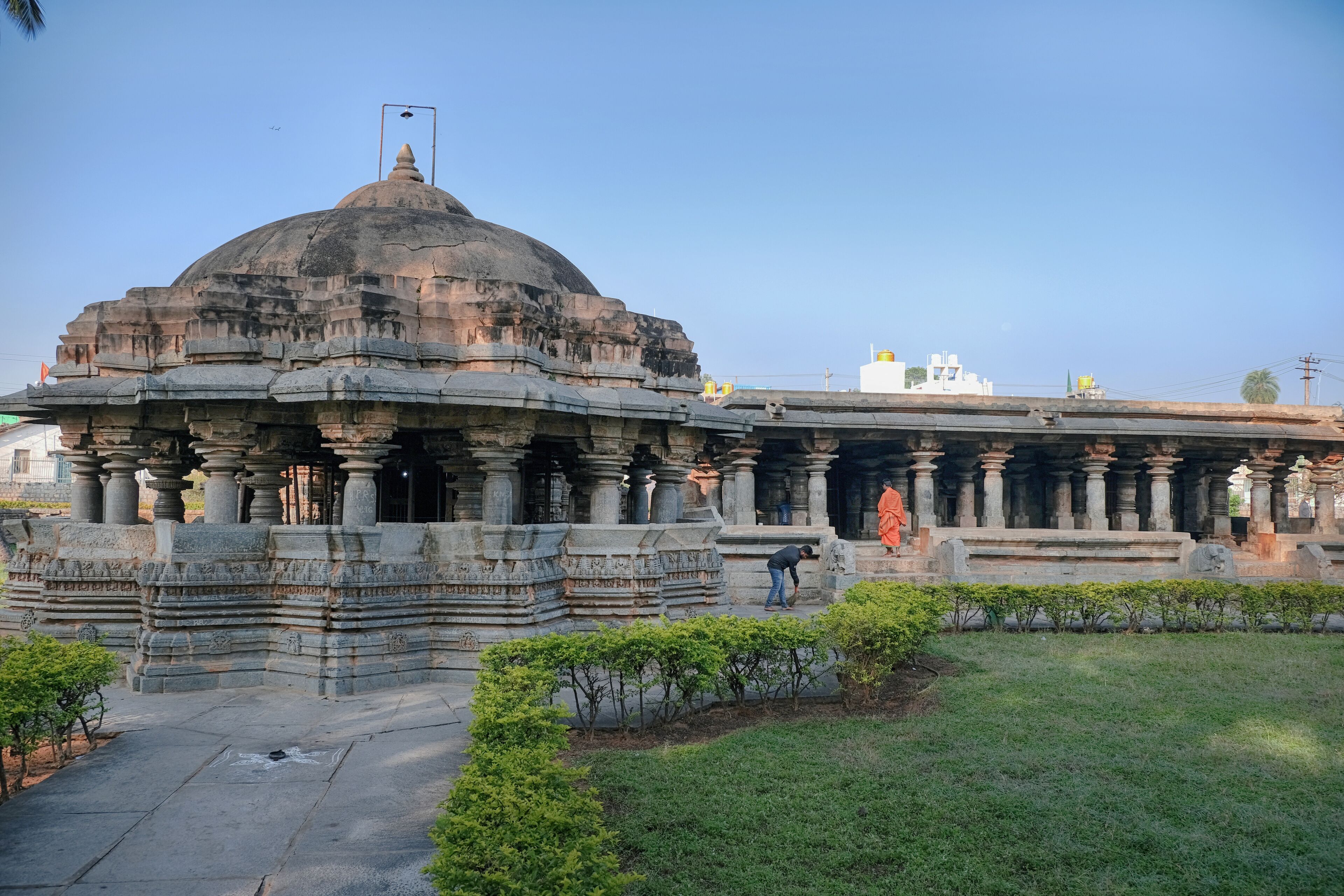 A large stone temple with a dome and intricate carvings.