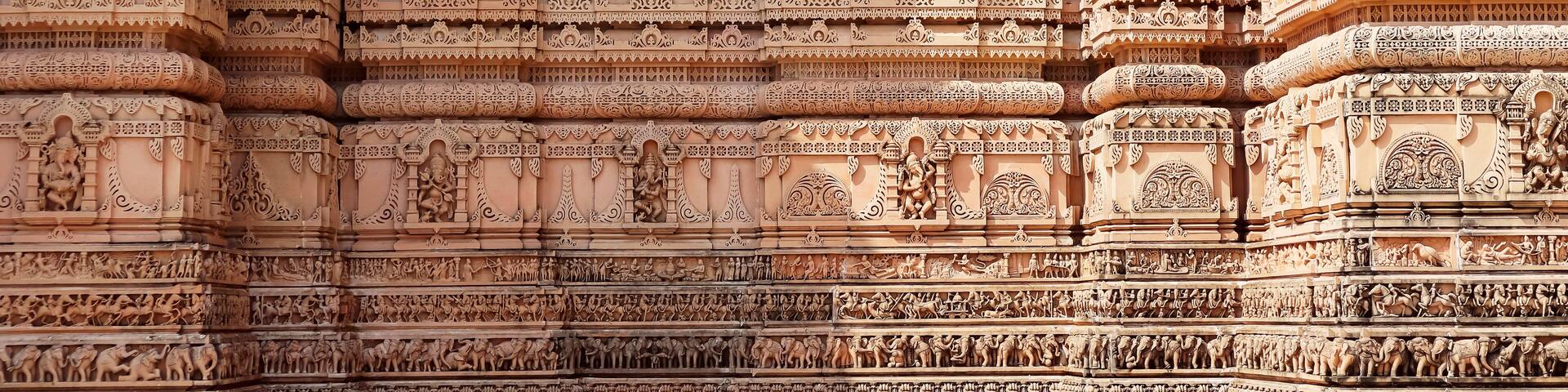 Beautiful carving sculptures of Hindu deities and animals on Shree Khondaldham Temple, Kagvad, Rajkot, Gujarat, India.