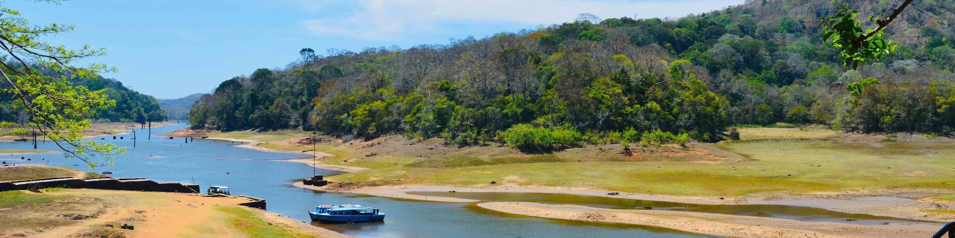 Periyar National Park, also known as Periyar Tiger Reserve, is in the mountainous Western Ghats of Kerala, southern India. This wildlife sanctuary is home to tigers and a significant elephant population, as well as rare lion-tailed macaques, sambar deer, leopards and Indian bison. In the park's north, Periyar Lake is popular for boat rides. Farther north, spice plantations surround the town of Kumily.#Greatoutdoors#perspectives#Trekking