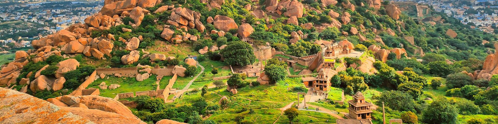 Chitradurga fort ruins and cityscape on a cloudy morning