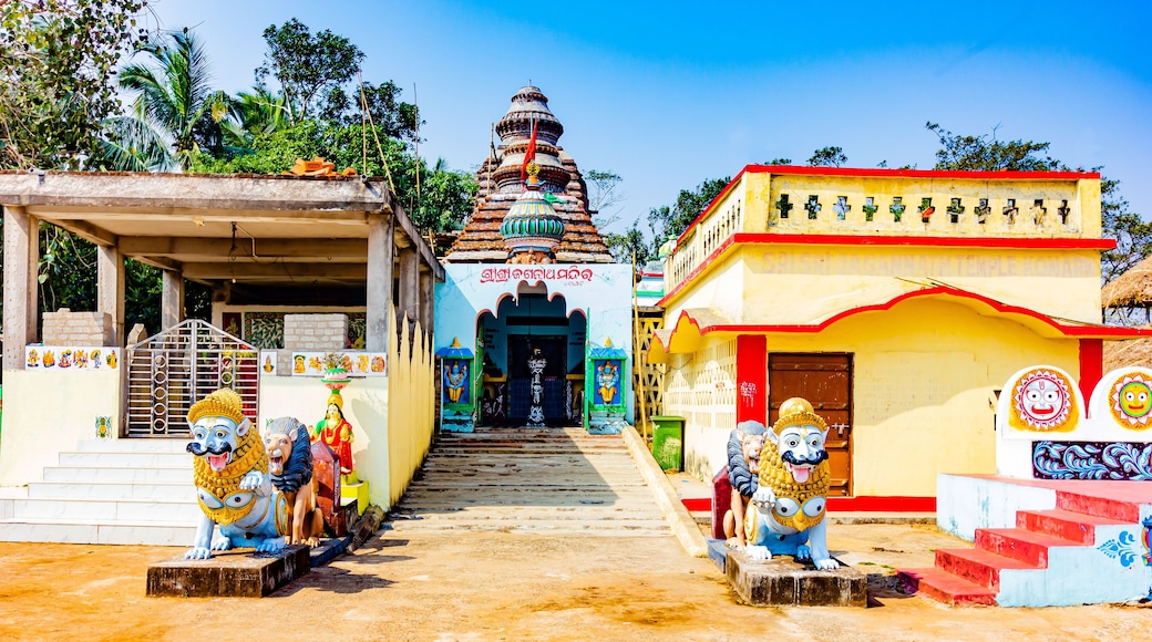 Colorful Hindu Temple of Sri Sri Jagannath at Konark, Odisha, India, with beautifully carved stone lions guarding the entrance.