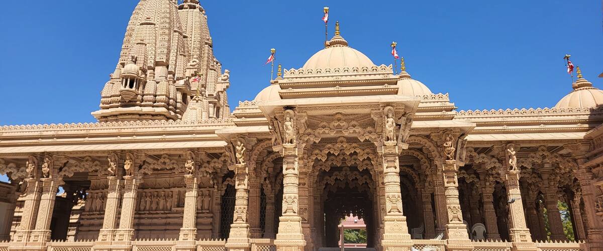 A temple with intricate carvings and multiple spires.