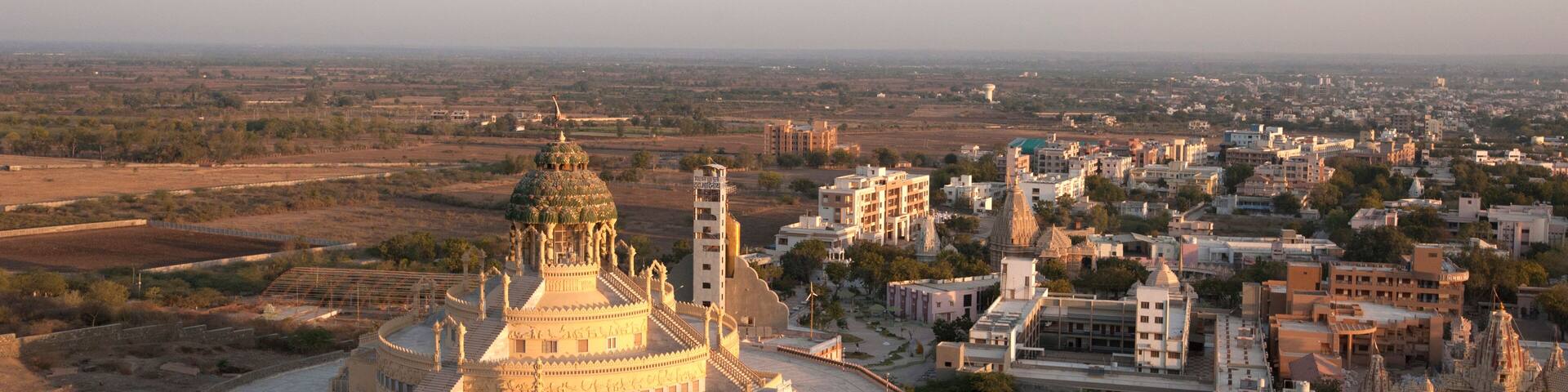 Jain temple, newly constructed, at the foot of Shatrunjaya Hill, in the early morning sunshine, Palitana, Gujarat