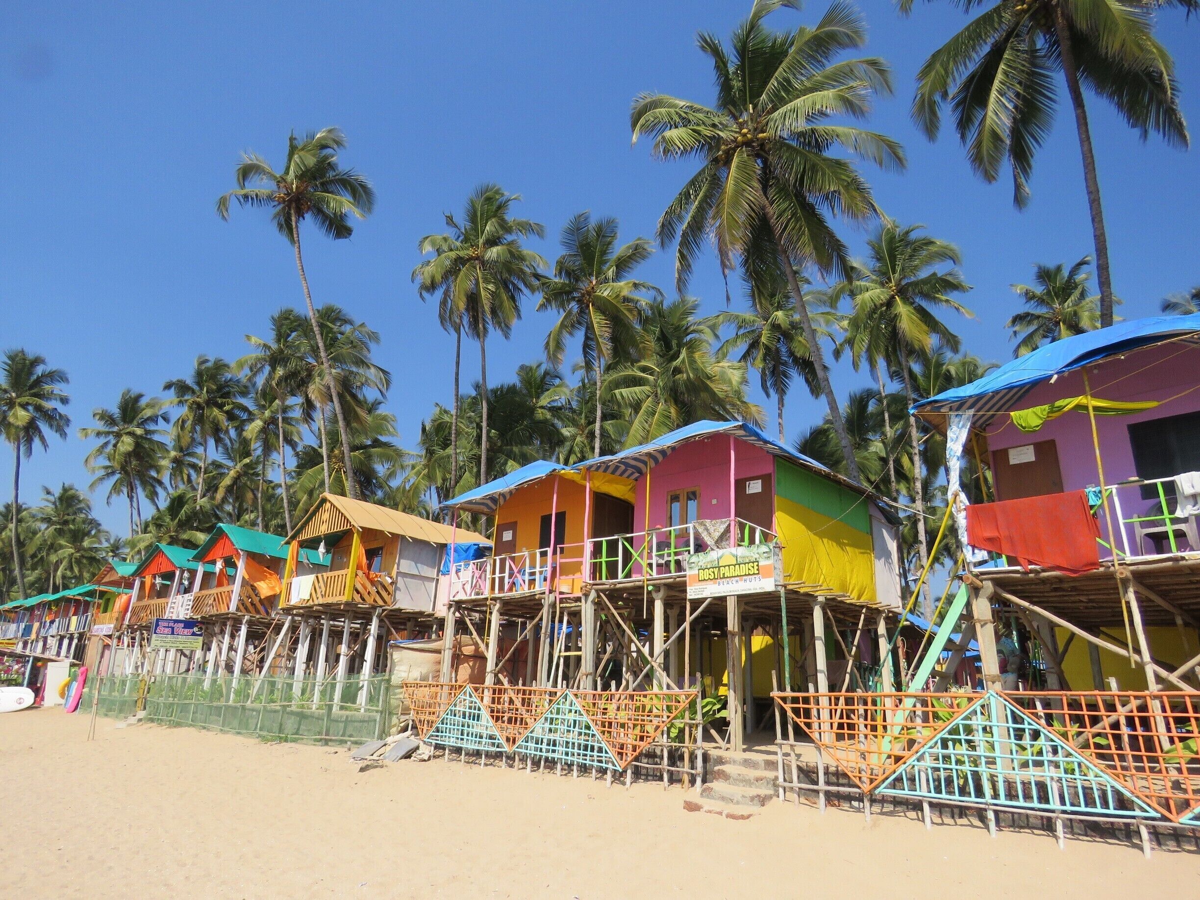 Waking up after a night in one of these colourful beach huts on Palolem Beach, Goa, India is like waking up in Paradise.