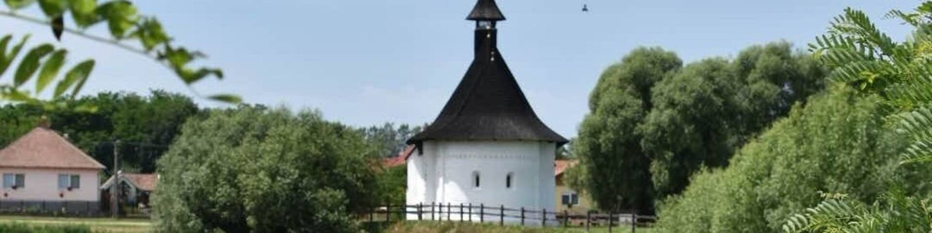 The Calvinist church of Csengersima in #Romanesque style was built in the 13th century. The pond is a blind channel of the river #Szamos.