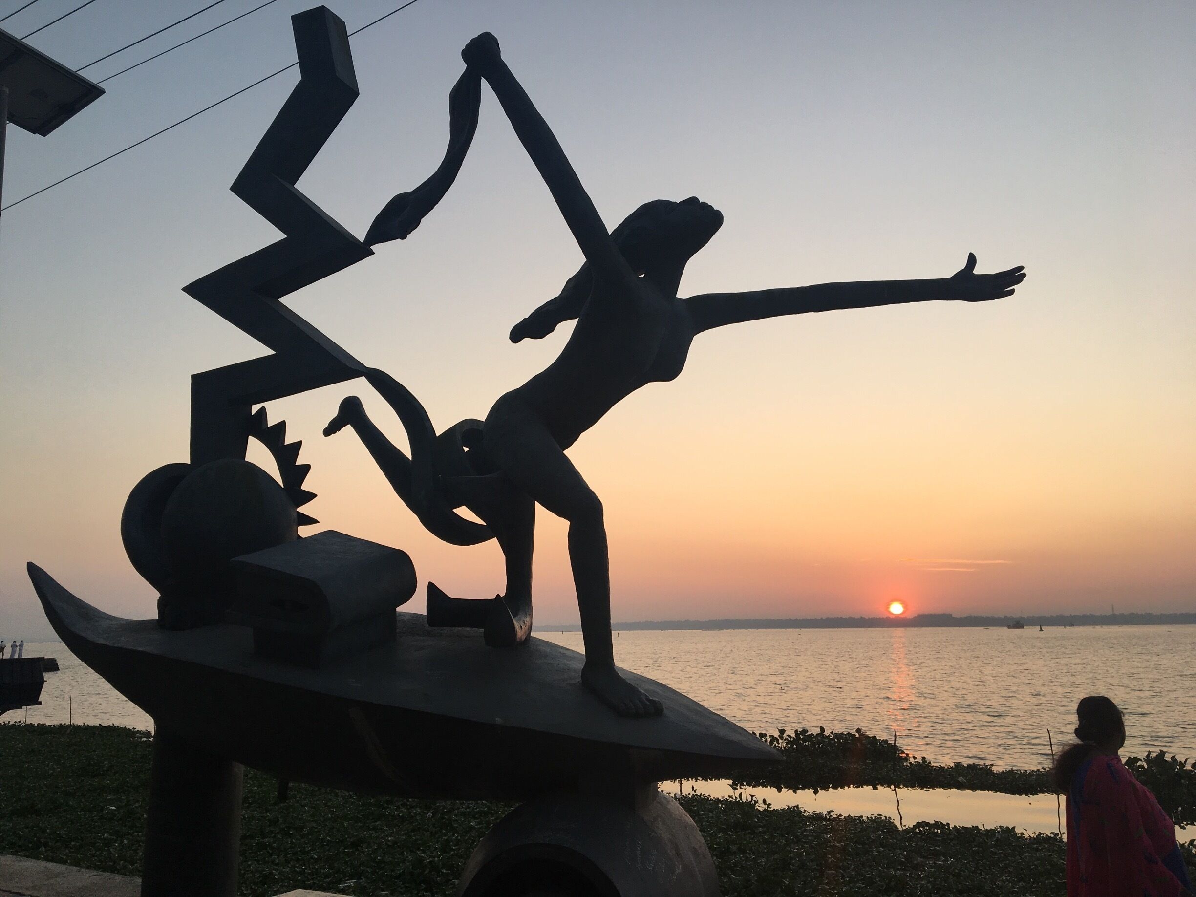 
Vaikom, backwater front is a town in Kerala, South India. 
Near to Vaikom boat jetty, on the way to the public beach, are 10 sculptures, each of them reminding us of events in the historic Vaikom Satyagraha. They tell tales starting from Dalavakkunnu, where those who fought for social change were cut down and buried many years before the historic protest, to various scenes from the Satyagraha itself.
