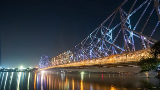 Howrah bridge on the river Hooghly with the twilight sky. The cantilever bridge is considered the busiest bridge in India.