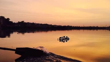 Beautiful sunset from boat & picture took when I went to worship Dwarikadheesh Mandir, Mathura.