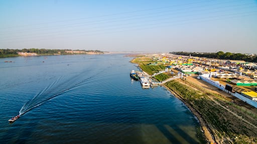 Aerial view of tent city and Triveni Sangam at The Maha Kumbh Mela in Prayagraj, Uttar Pradesh, India. The Mahakumbh Mela is a Hindu festival that happens every 12 years.
