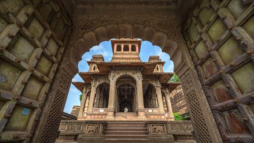 Maheshwar, Madhya Pradesh, India - August 25, 2023: Exterior shots of the scenic tourist landmark Maheshwar fort and temple. This monument is on the banks of the Narmada River.