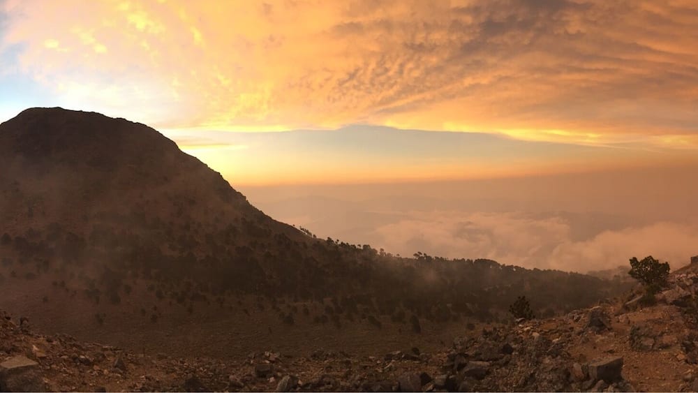 Sunset from Cerro ConcepciĂłn, the smaller peak of Tajulmuco. The larger peak in the photo is the main peak of Tajulmuco. We hiked with Quetzeltrekkers and enjoyed it - this is a hike you need to do with a guide, and prepare for the cold!
