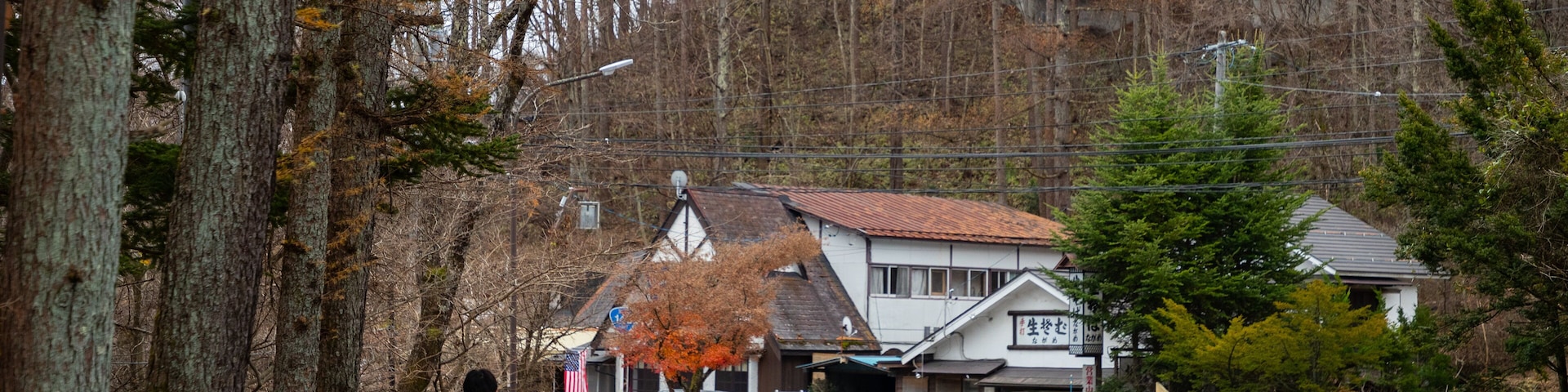 Hoshino Onsen Hot Spring featuring a small town or village and street scenes as well as an individual male