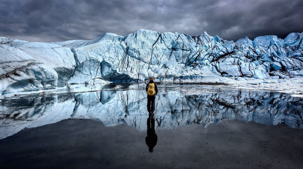 At 27 miles long by 4 miles wide, it is the largest glacier accessible by car in the United States. While taking a guided tour with my friend, we walked through hundreds of feet of vein like tunnels of ice, we ended up in a wide opening that had one of the most beautiful reflections I have ever seen/photographed in my life.
(RyanCorlisPhotography) #Adventure #Alaska #Glacier