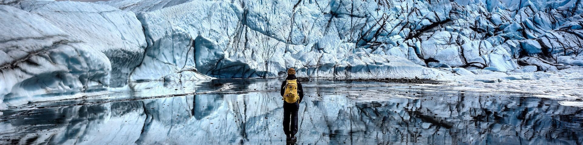 At 27 miles long by 4 miles wide, it is the largest glacier accessible by car in the United States. While taking a guided tour with my friend, we walked through hundreds of feet of vein like tunnels of ice, we ended up in a wide opening that had one of the most beautiful reflections I have ever seen/photographed in my life.
(RyanCorlisPhotography) #Adventure #Alaska #Glacier