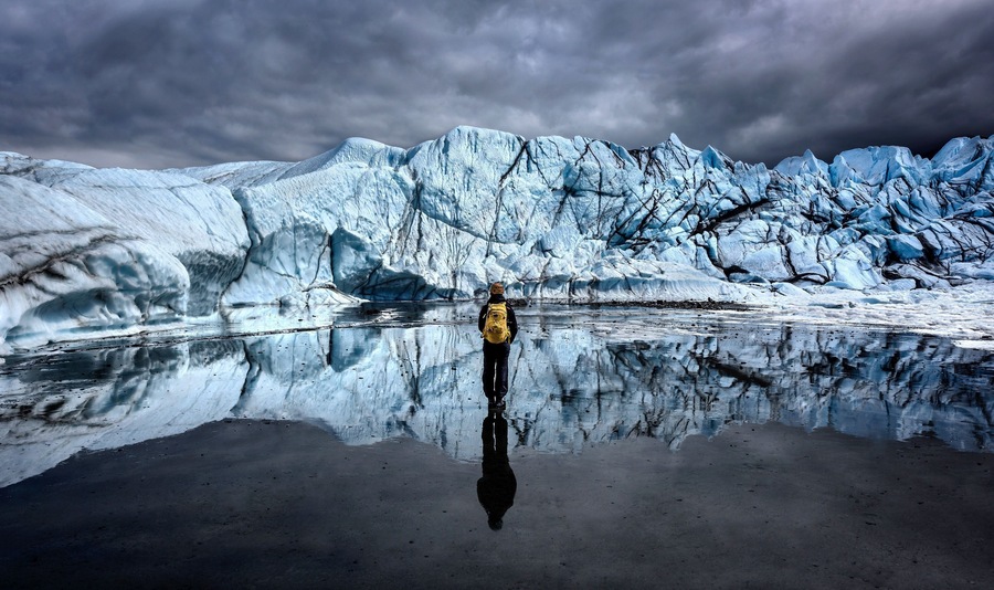 At 27 miles long by 4 miles wide, it is the largest glacier accessible by car in the United States. While taking a guided tour with my friend, we walked through hundreds of feet of vein like tunnels of ice, we ended up in a wide opening that had one of the most beautiful reflections I have ever seen/photographed in my life.
(RyanCorlisPhotography) #Adventure #Alaska #Glacier