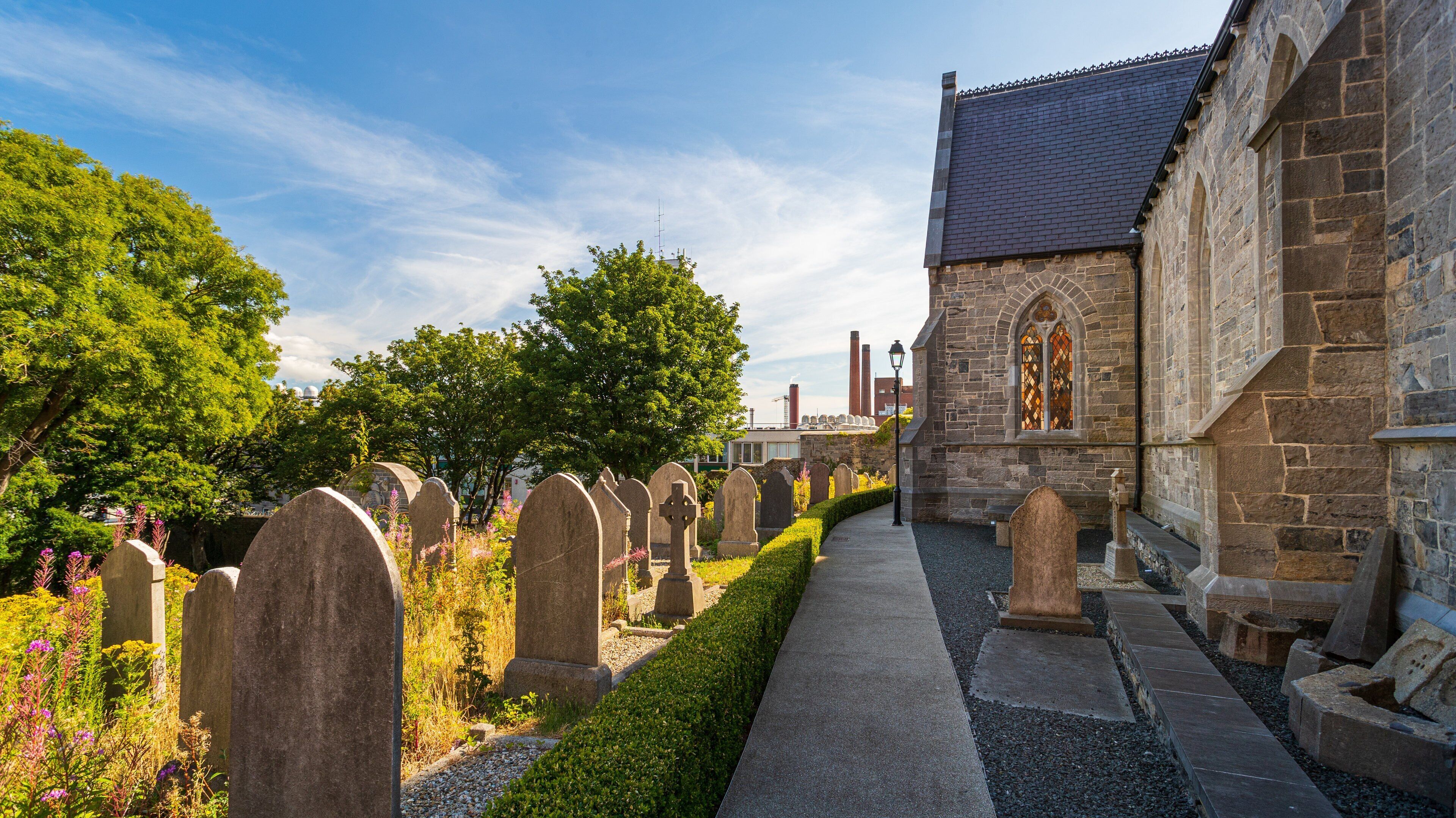 Pearse Lyons Whiskey Distillery featuring a church or cathedral and a cemetery