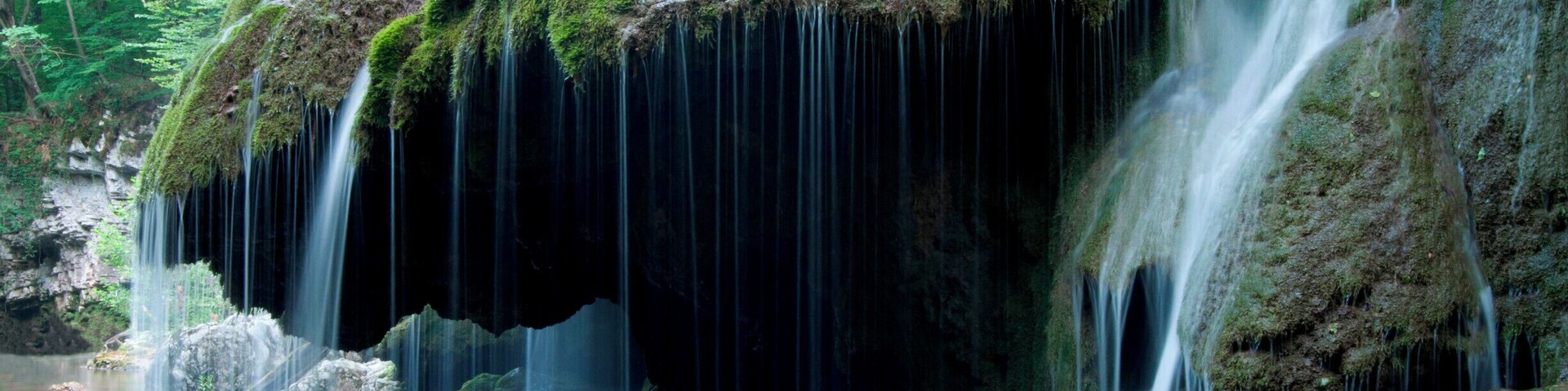 'Located on the 45th parallel north, Bigăr Waterfall is extremely delicate and unusual, with a water curtain falling down some lush green vegetation, and is set in a very remote, peaceful, and picturesque area of Romania, where the rolling hills create a real fascination for the authenticity of our nation’s past. On our way back to the main road, we made another detour to see the water mills at Eftimie Murgu, some of them still functional, and smell the freshly ground cereal grains.'
#waterlust