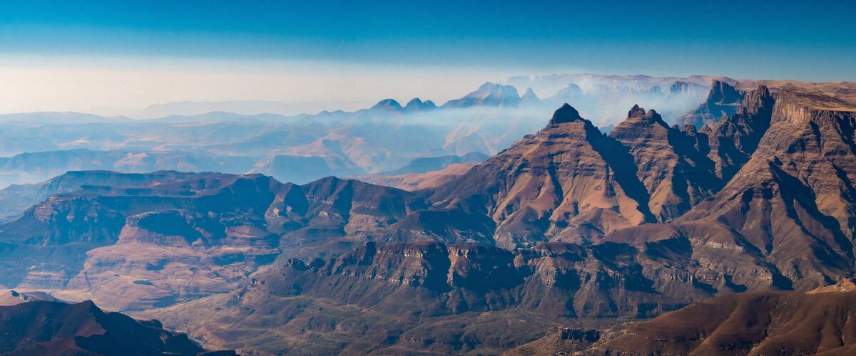 A rugged mountain range with sharp peaks and deep valleys.