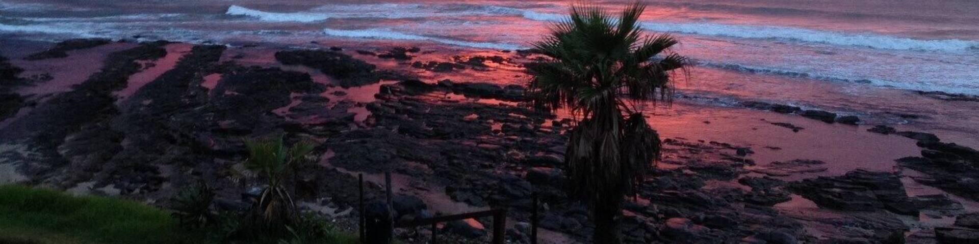 Sunrise in the rain 5 am in Morgan bay - early bird catches the worm