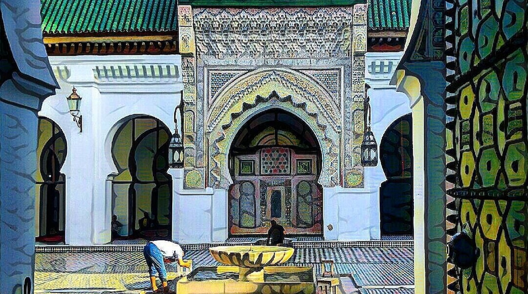 #patterns An edited photo of the interior courtyard of a mosque in the middle of the old Medina in Fes. One man is already praying while the other is performing the pre prayer ritual at the fountain