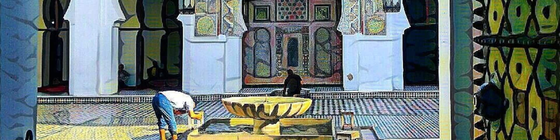#patterns An edited photo of the interior courtyard of a mosque in the middle of the old Medina in Fes. One man is already praying while the other is performing the pre prayer ritual at the fountain
