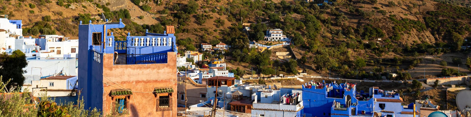 Blue city of Chefchaouen on a background of Rif mountains, Morocco