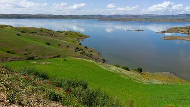 Panoramic view of the artificial lake of Bin el Oiudane in High Atlas in Morocco with blue sky. Widescreen photo