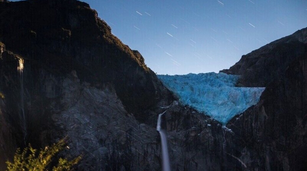 Dear lord this place! I had never heard of it before doing my bit of research on Patagonia, and it ended up being my favourite spot on the Carretera Austral.
I shot this at night just as a full moon was rising to give a bit of light to the glacier and waterfall.