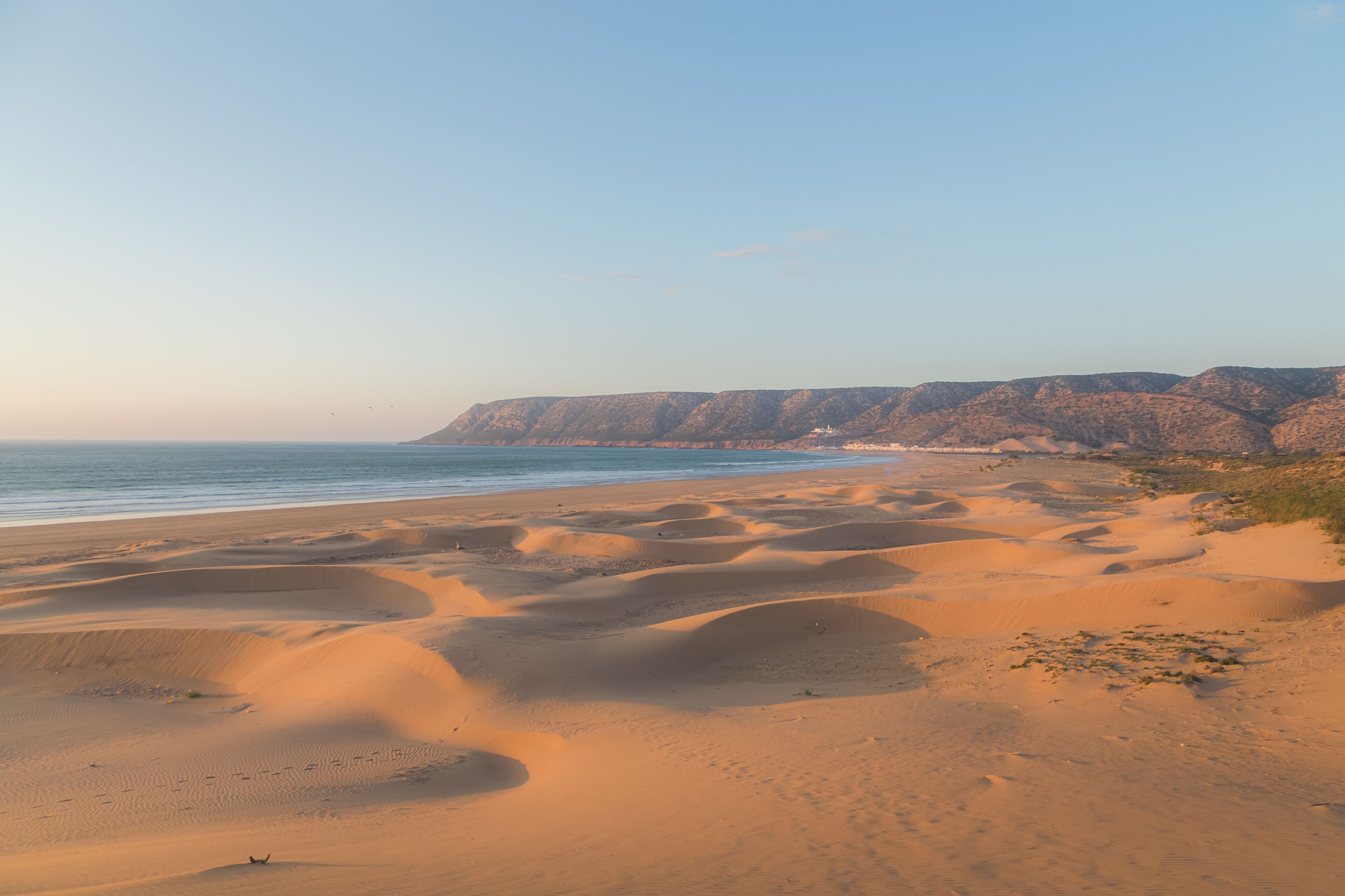 Sandy dunes at the beach outside the seaside fishing village of Tafedna in Essaouira province, Morocco.