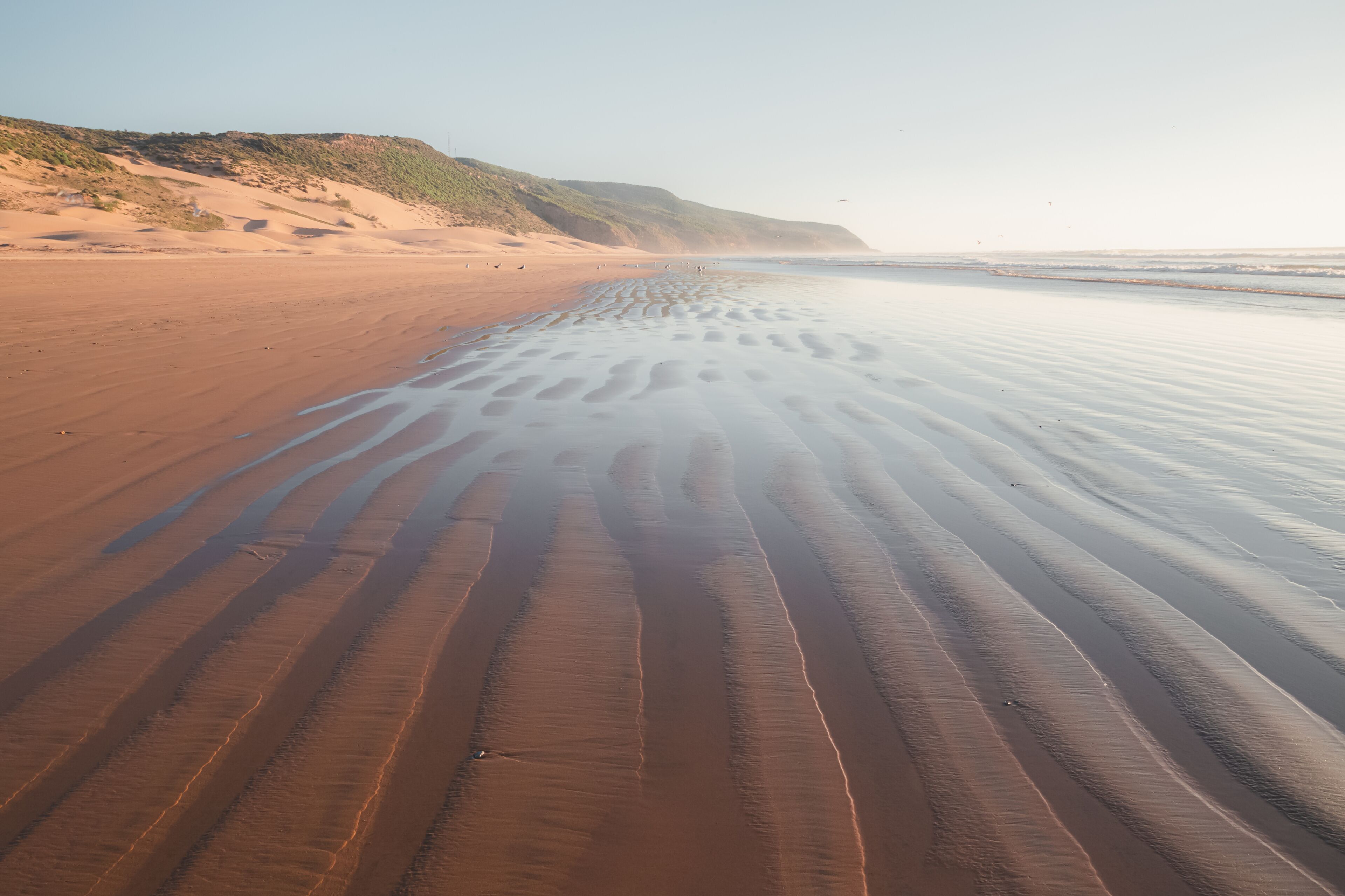 Patterns in the sand at the beach outside the seaside fishing village of Tafedna in Essaouira province, Morocco.