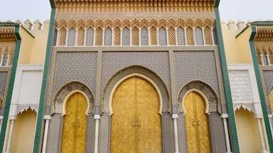 Brass doors to the Dar El Makhzen the Kings Royal Palace with intricate Zellige tilework in Fes Morocco