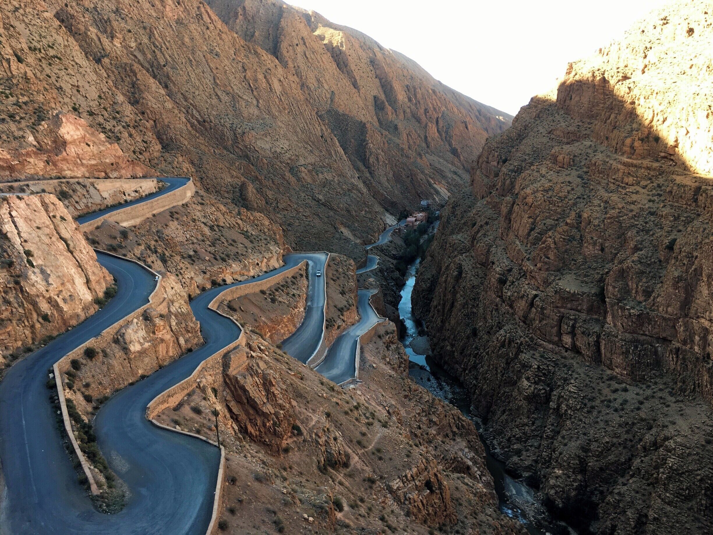 Venturing out into mountains, valleys and desert of Morocco was one of the most exciting trips we've taken. The Dadés Valley east of Marrakech features incredible gorges and smooth roads with hair pin turns like this one on Route 704. We had a guide bring us to this lookout point in Tisdrine after staying the evening nearby at Hôtel Babylon Dadés. #InStone #Morocco #scenicdrive #gorges 
