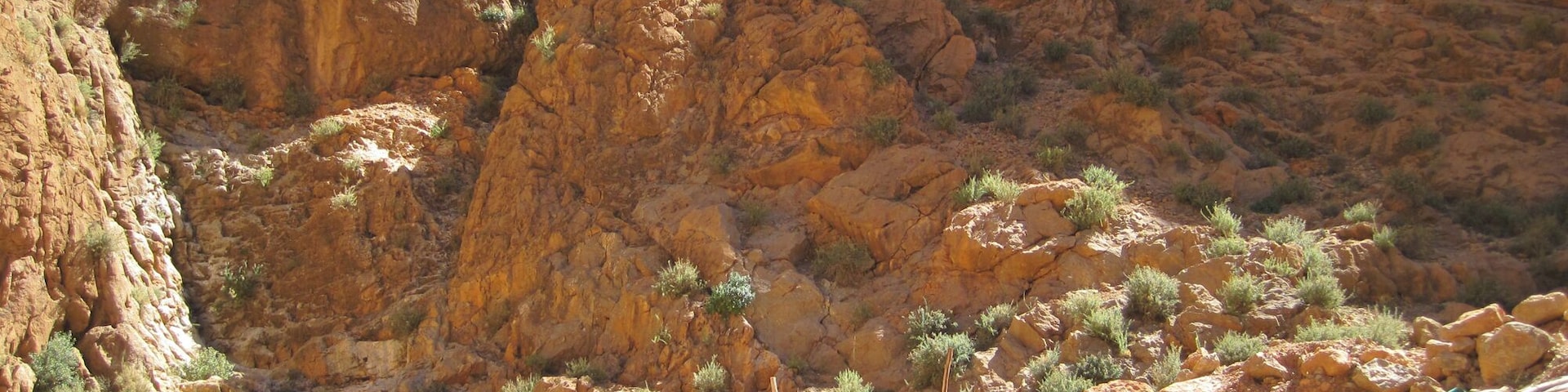 A small, narrow gorge with vendors dotting the road. The surrounding cliffs are popular with climbers.