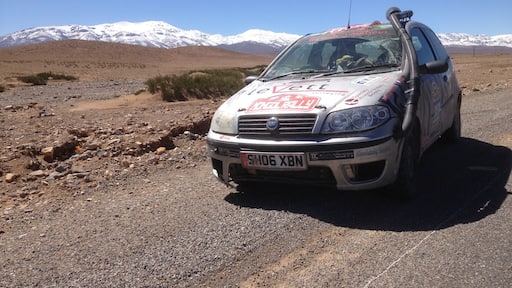 Driving in Morocco north through the High Atlas Mountains. After taking part in the Spring Edition of the Maroc Challenge 2016