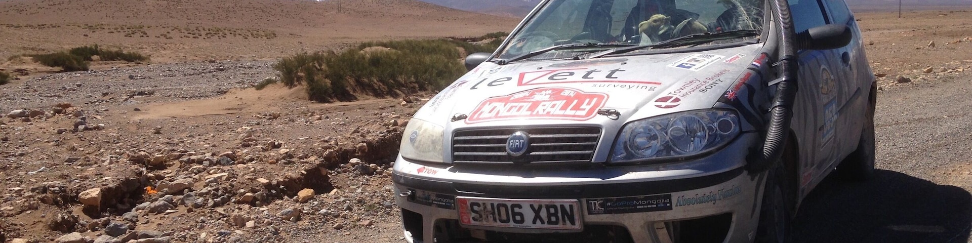Driving in Morocco north through the High Atlas Mountains. After taking part in the Spring Edition of the Maroc Challenge 2016