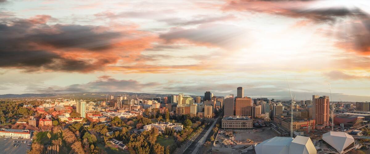 Stunning aerial panoramic view of Adelaide skyline at sunset, South Australia