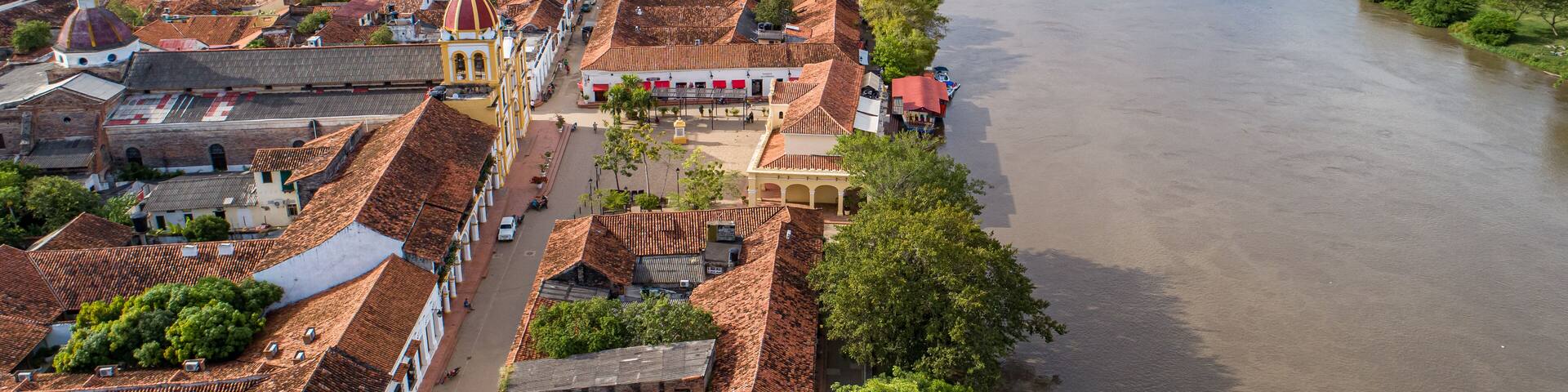 Aerial view of the historic town Santa Cruz de Mompox and river in sunlight, Colombia, World Heritage