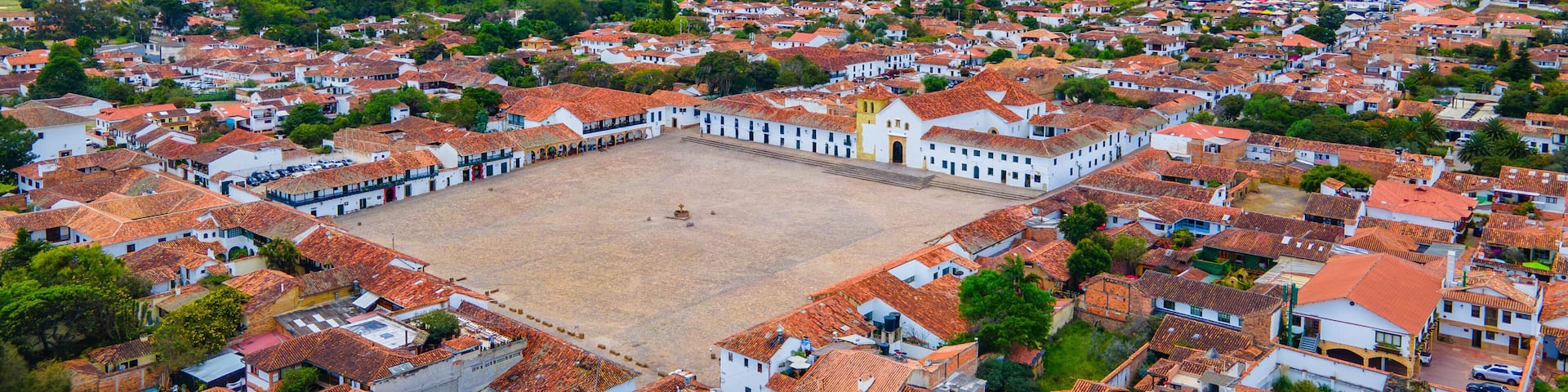 Aerial View of Villa de Leyva, Boyacá, Colombia with Scenic Mountains and Traditional Architecture