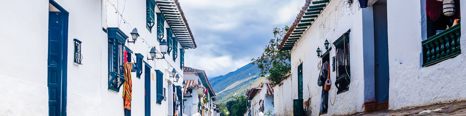 view of a cobbled street in colonial town Villa de Leyva, Colombia