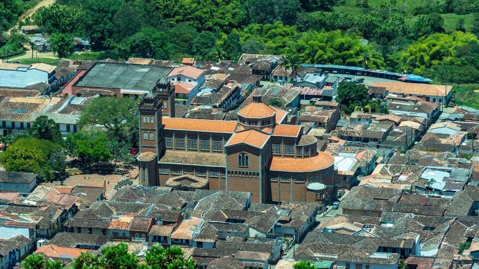 Aerial view of the brick church of Jerico (Catedral Virgen de las Mercedes), Antioquia, Colombia, from the Cerro las Nubes (Mount of the Clouds).