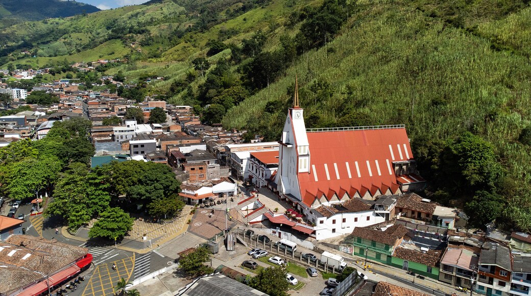Cisneros, Antioquia - Colombia. September 15, 2024. Catholic parish located in the main park of the town.