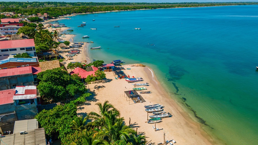 Aerial View of Rincon del Mar Beach, Sucre, Colombia with Boats and Tropical Landscape