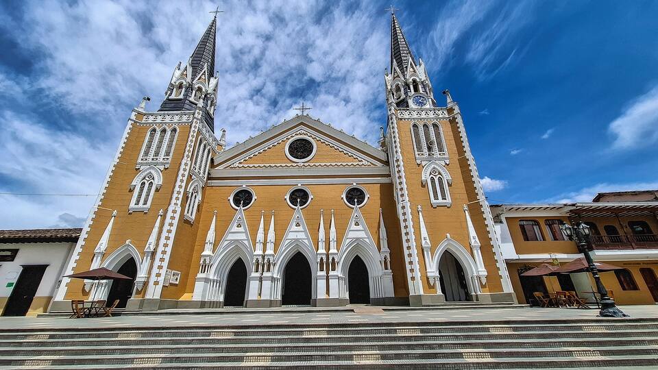 A large church with two tall spires and a central dome.