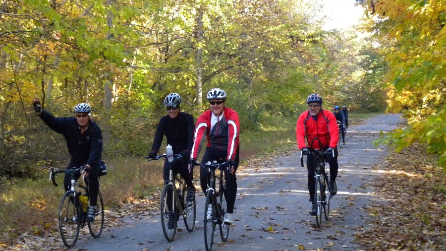 Southern Illinois showing cycling and forests as well as a small group of people