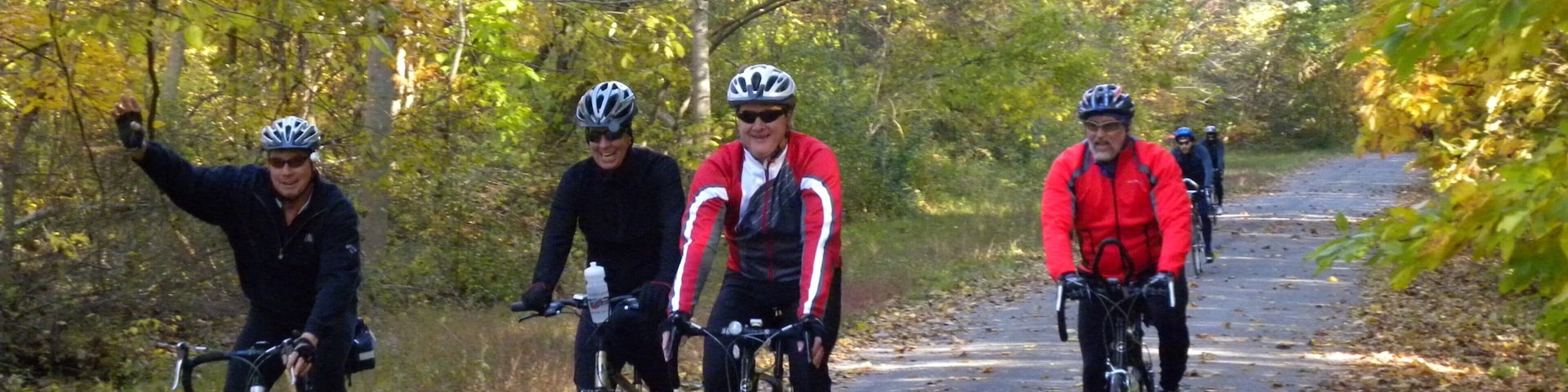 Southern Illinois showing cycling and forests as well as a small group of people